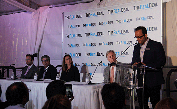 Metropica's Jordan Kavana speaks while (from left) Arnaud Karsenti, Carlos Rosso, Peggy Fucci and Reginald Fairchild look on
