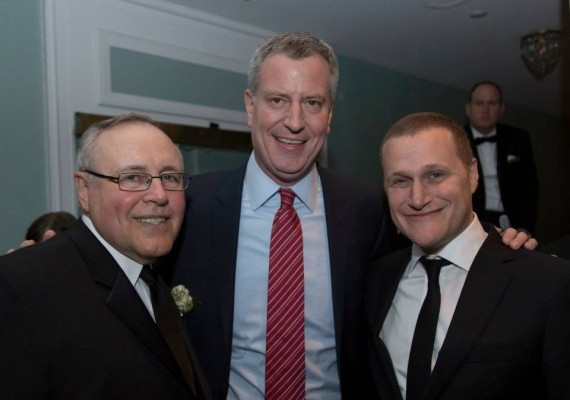 From left: Steven Spinola poses with Mayor Bill de Blasio and Rob Speyer at the 2015 REBNY gala (Credit: Gotham for REBNY)