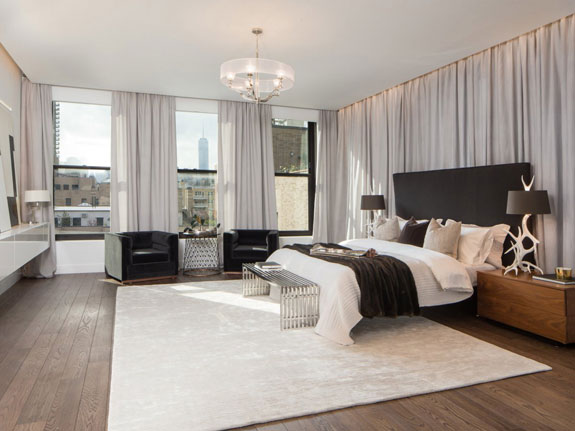 the-master-bedroom-is-also-very-spacious-offering-marvelous-views-of-the-city-below