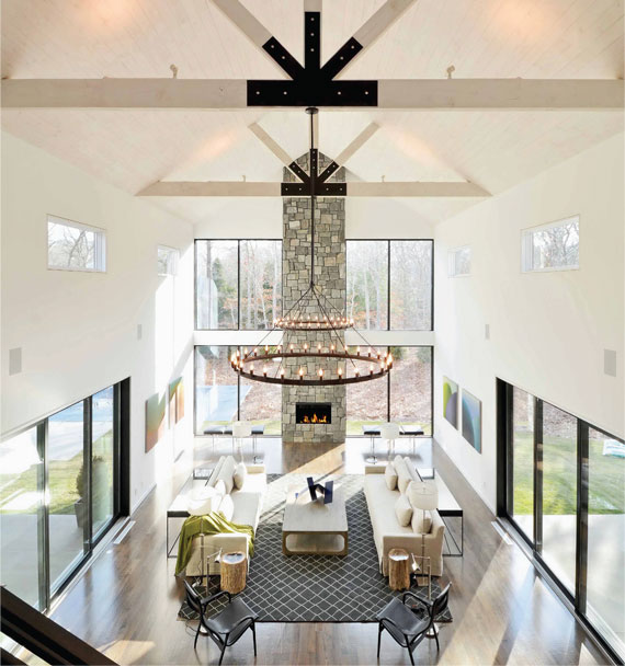 A loft-like interior in one of Plum Builders’ Modern Barn abodes.