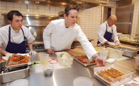 Chef Keller in the kitchen with his staff at Per Se