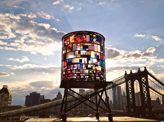 Artist Tom Fruin’s “Watertower” on the rooftop at Two Trees’ 20 Jay Street in Dumbo, a neighborhood where the firm has established itself as a patron of the arts.