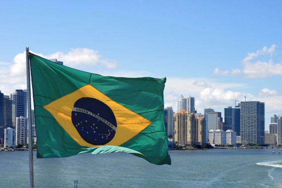 A view of the Brickell skyline from 2009 (Credit: creative commons user MiamiTom) and the flag of Brazil (Credit: Max Hendel)