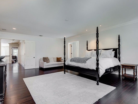 the-oversize-master-suite-features-hardwood-floors-and-a-spacious-airy-layout