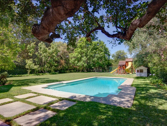 with-more-than-three-acres-the-estate-includes-a-saltwater-pool-and-playground