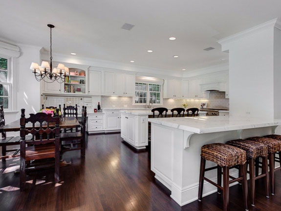 with-two-dishwashers-a-center-island-breakfast-bar-desk-area-and-plenty-of-counter-space-the-gourmet-kitchen-is-a-cooks-dream