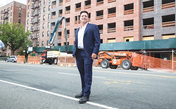 Developer Mark Stagg at the under-construction 6155 Broadway,