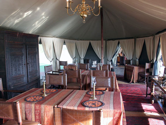 our-dinner-table-was-in-the-dining-tent-but-guests-are-served-dinner-at-tables-set-up-throughout-camp-and-guests-who-stay-several-days-can-expect-to-eat-in-a-different-location-every-night