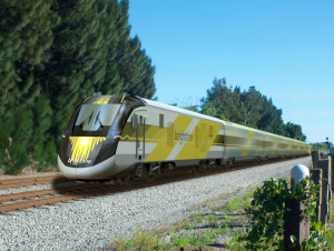 A frontal shot of Brightline's lead car, which feature yellow-and-black color schemes
