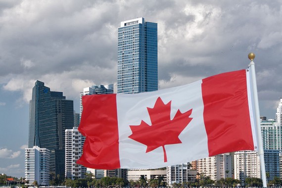 A December 2011 of Miami's skyline (Credit: John Spade) and the Canadian flag