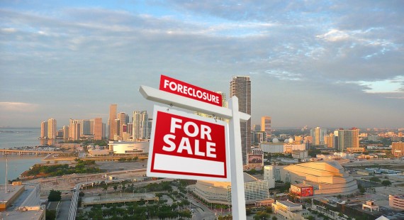 A June 2011 photo of the downtown Miami skyline (Credit: Marc Averette) and a foreclosure sign