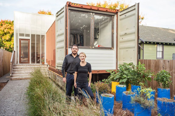 Seth Rodewald-Bates and Elisabeth Davies at their shipping container home in the Carrollton neighborhood of New Orleans (via Apartment Therapy)
