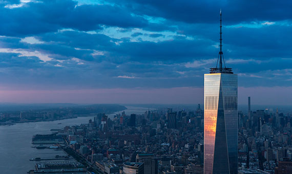 Aerial View of One World Trade Center at sunset, photographed from a helicopter by Evan Joseph