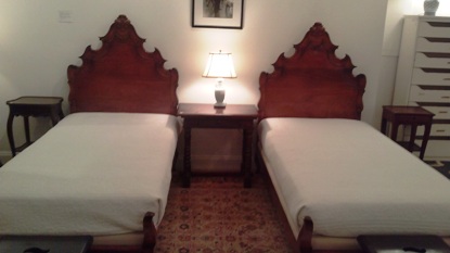 This pair of walnut beds sold for $20,000.