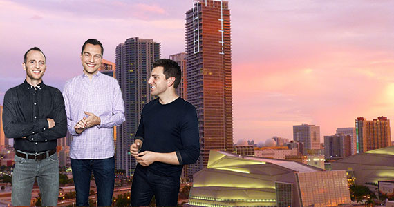 The downtown Miami skyline and Airbnb founders Joe Gebbia, Nathan Blecharczyk and Brian Chesky