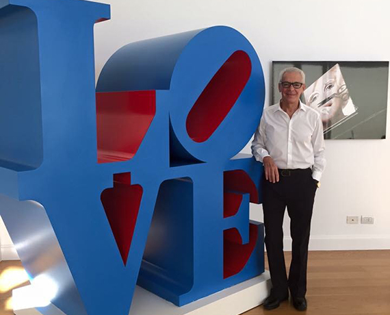 Eduardo Costantini and "Love" by Robert Indiana at Costantini's Buenos Aires apartment