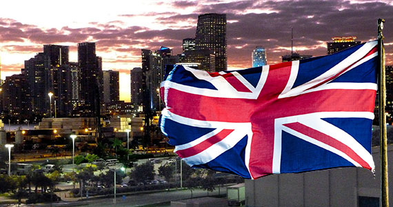 2011 photo of the Miami skyline and the United Kingdom's flag