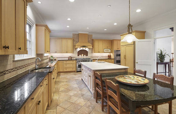 the-kitchen-is-large-complete-with-a-butlers-pantry-granite-counters-and-two-sub-zero-refrigerators