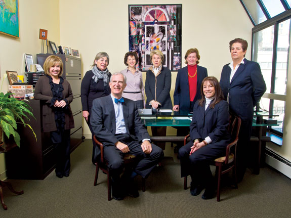 Warburg Realty CEO and majority shareholder Frederick Peters, with fellow shareholders (from left) Linda Reiner, Judith Thorn, Wendy Greenbaum, Jane Andrews, Jane Bayard, Ronnie Lane and Bonnie Chajet. Not pictured: Lisa Deslauriers.