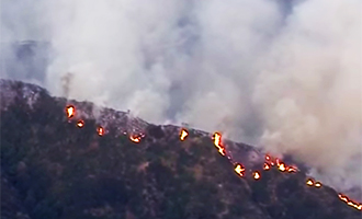 The fire on mountains north of the San Gabriel Valley (credit: YouTube)