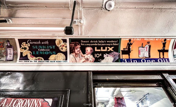 inside-the-subway-cars-are-collections-of-advertising-from-the-early-1900s