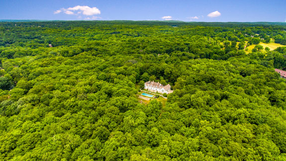 The home is tucked away into a 300-acre nature reserve