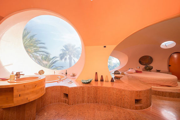 in-one-of-the-bathrooms-which-looks-more-like-a-spa-the-sink-and-bath-are-curved-you-wont-find-any-straight-lines-in-this-house