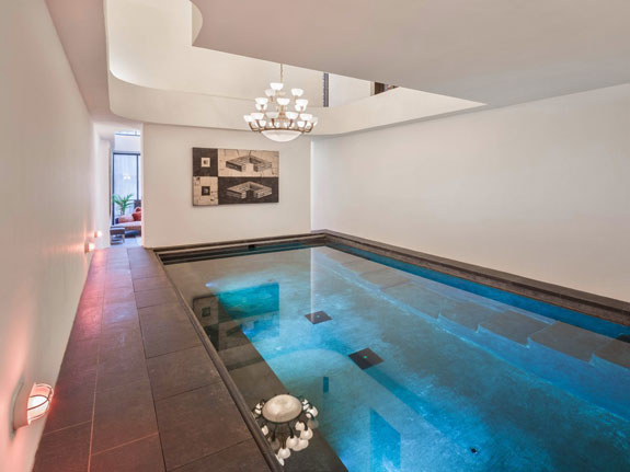 in-the-basement-of-her-luxurious-townhouse-swift-has-an-awesome-indoor-pool-with-a-chandelier-hanging-over-it