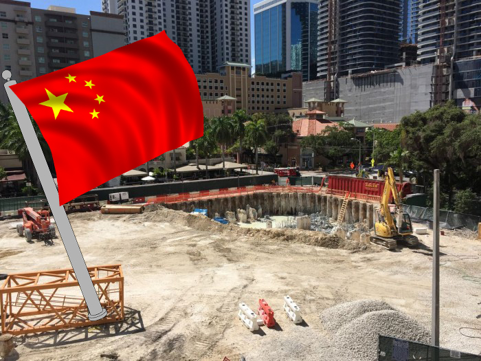 Brickell Flatiron construction site in September and the Chinese flag