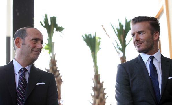 Commissioner Don Garber and David Beckham at a Miami press conference in 2014 (Credit: Getty Images)