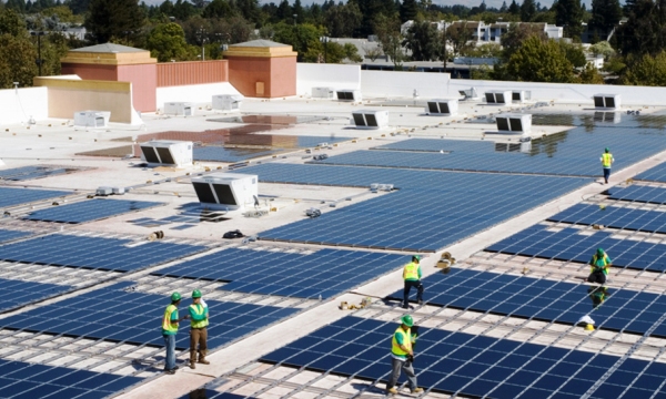 A SolarCity rooftop panel installation at a Walmart store.