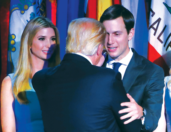 Jared Kushner and his wife, Ivanka,congratulate Donald Trump after his victory speech last month.