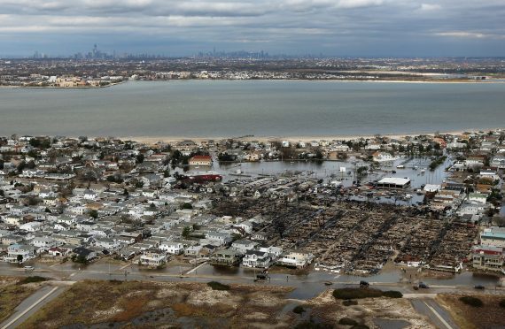 The remains of burned homes after Sandy in Breezy Point, Queens (Credit: Getty Images)