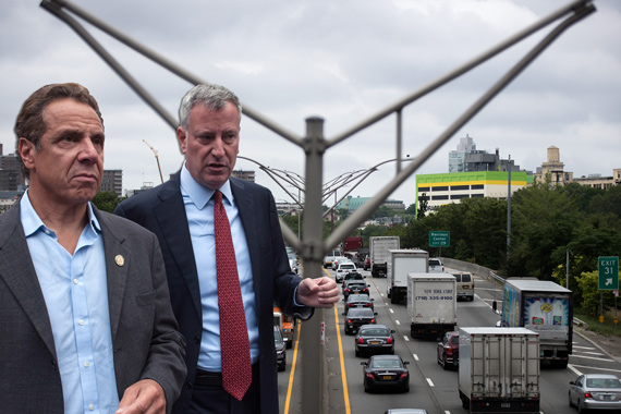 Andrew Cuomo, Bill de Blasio and the Brooklyn- Queens Expressway (Credit: Getty Images)