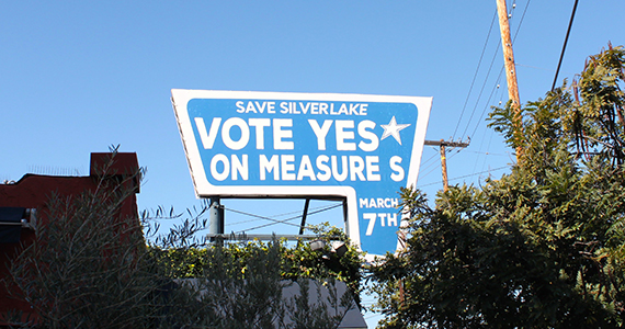 Sunset Junction sign reworked to draw support for Measure S (Hillel Aron/LA Weekly)