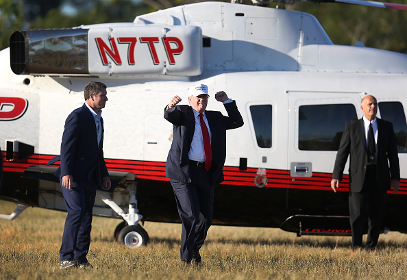 Donald Trump arriving at a campaign rally in Naples (Credit: Getty Images)