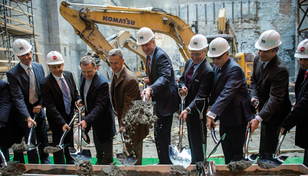 Peter Ward (in brown jacket) and Mayor Bill de Blasio (center) with Steve Witkoff and executives from Maefield Development (left); and Michael Asher and Howard Lorber (right) at the groundbreaking for the Times Square Edition hotel.