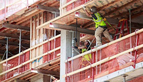<em>Construction workers in Brooklyn </em>(Credit:Drew<em> Angerer/Getty Images)</em>