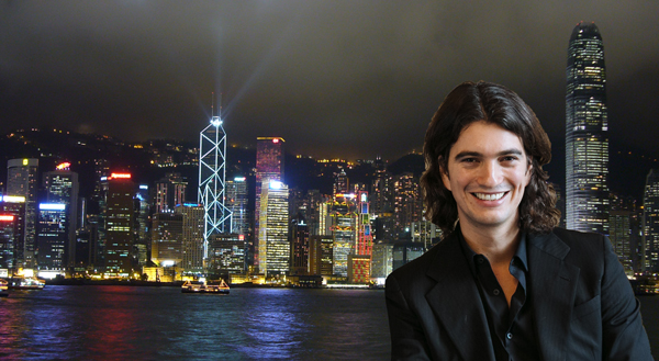 Adam Neumann and the Hong Kong city skyline