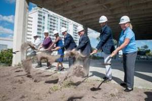 Atlis Cardinal principals Alberto J. Suarez (fourth from left) and Frank Guerra (fifth from left) participate in a groundbreaking ceremony for Prism on Fifth in St. Petersburg.