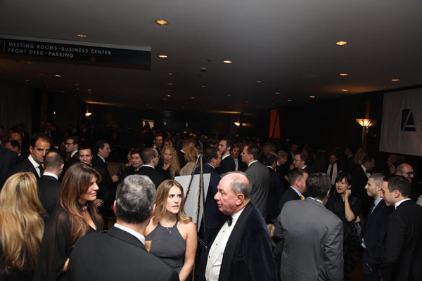 A crowd at the cocktail hour before the REBNY gala (Credit: Adam Pincus for The Real Deal)