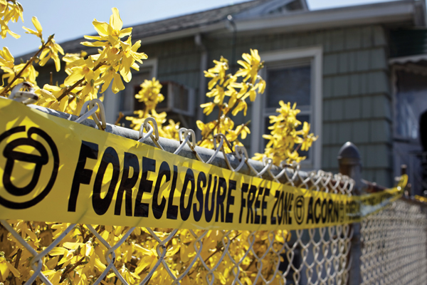 ACORN organized a protest of predatory home lending practices outside an Elmont home in April 2009.