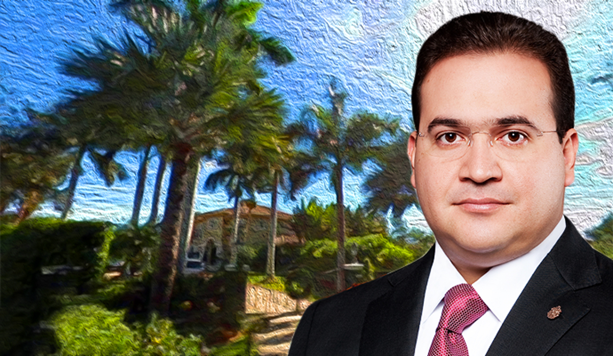 Javier Duarte in front of the house at 277 Marinero Court in Coral Gables