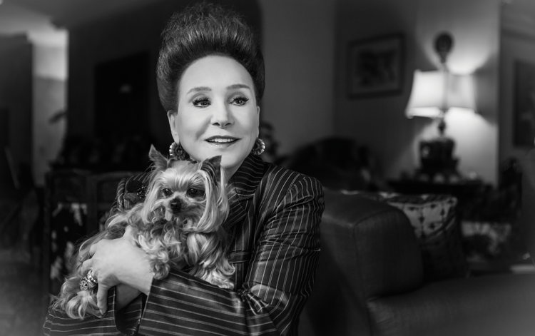 Cindy Adams with her treasured Yorkie, Juicy, photographed in her Park Avenue penthouse.