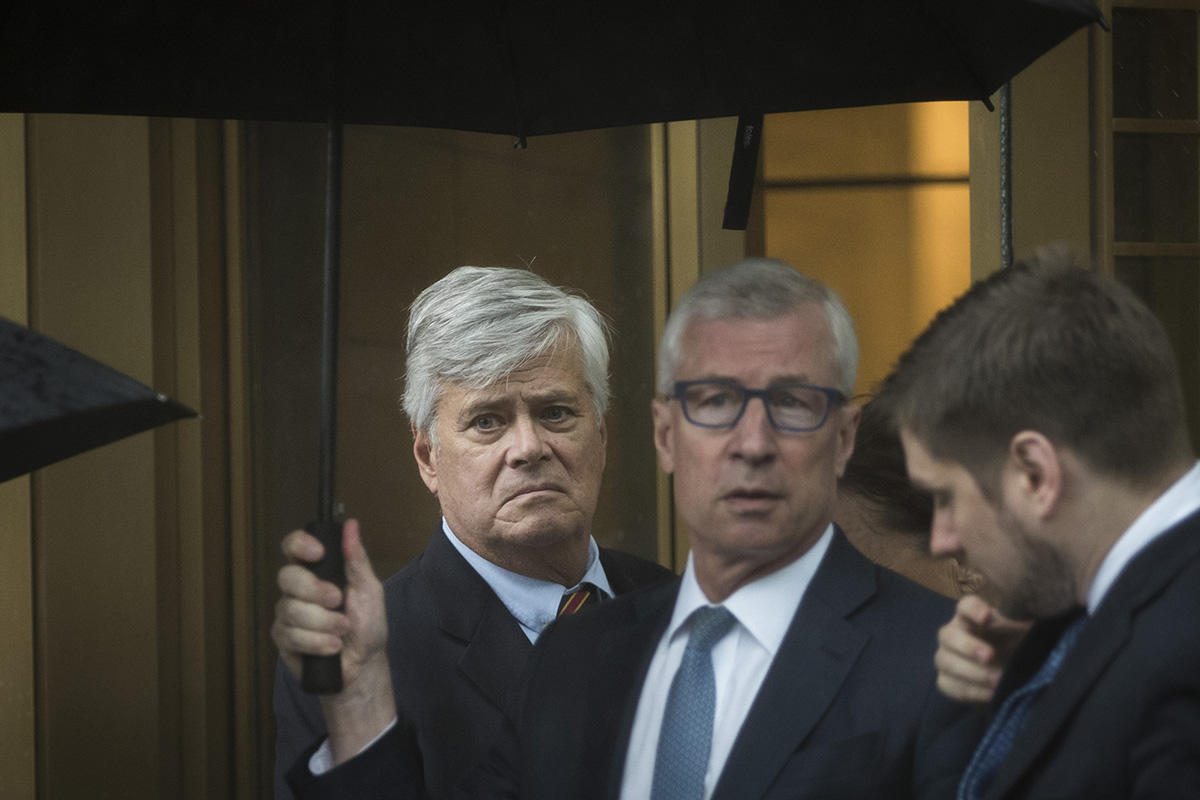 Dean Skelos exits federal court on Thursday. (Credit: Getty)