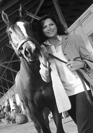 Rosenblum with her horse Champion of the Nile, American Pharaoh’s half brother.