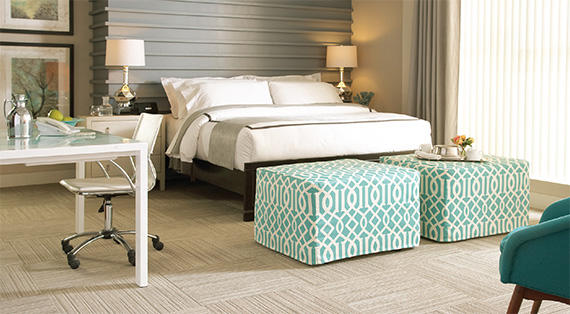 It’s the details that make a guest room comfy. Bonus: These Castro Convertibles ottomans also convert into beds.