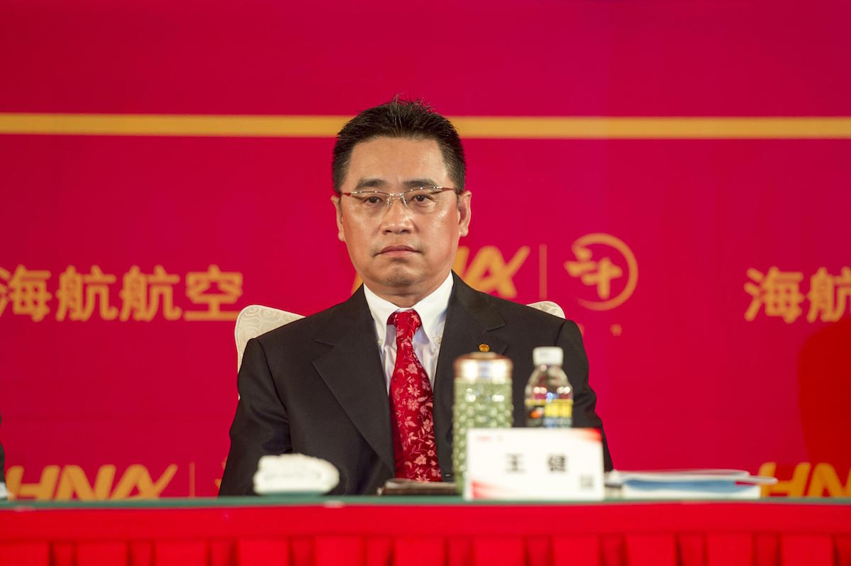 HAIKOU, CHINA - APRIL 28: Wang Jian, co-founder and chairman of China's HNA Group, attends a meeting to celebrate the 20th Anniversary of the tstablishment of HNA Group on April 28, 2013 in Haikou, Hainan Province of China. Wang Jian, co-founder and chairman of China's HNA Group, died at the age of 57 after falling down a stairway during a business trip to France on July 3. (Photo by Luo Yunfei/China News Service/VCG)