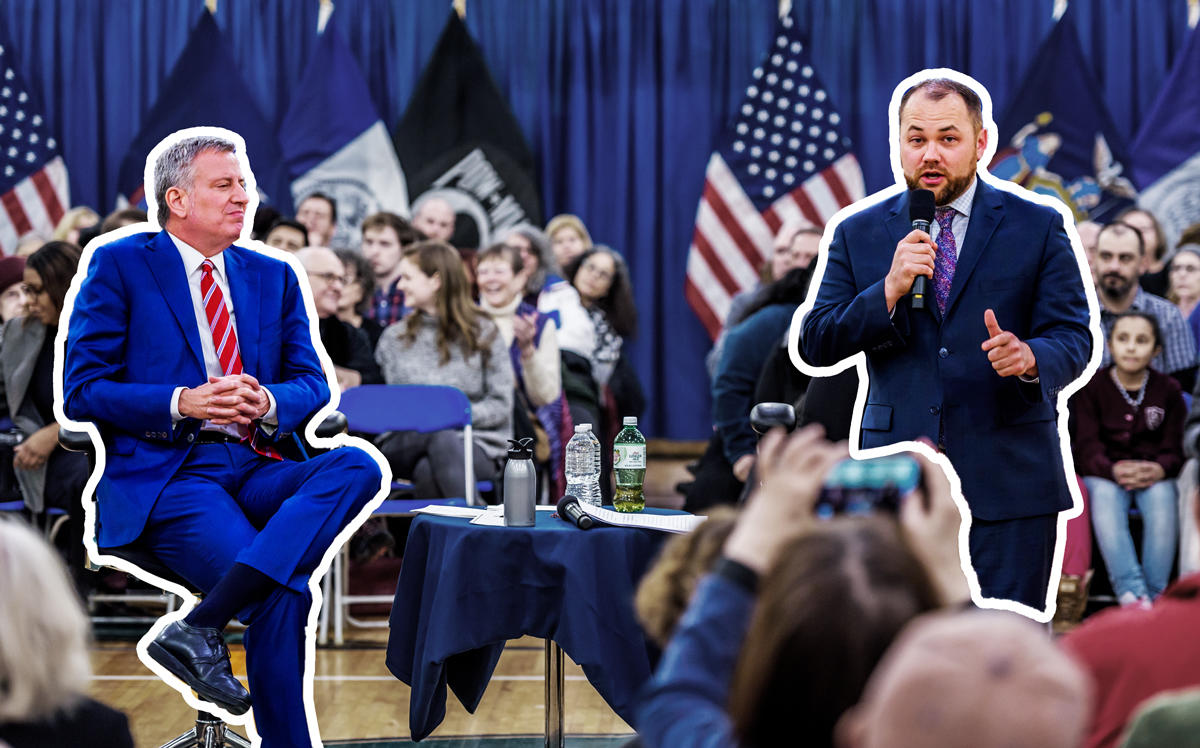 Mayor Bill de Blasio and Councilman Corey Johnson at a town hall meeting (Credit: Getty Images)