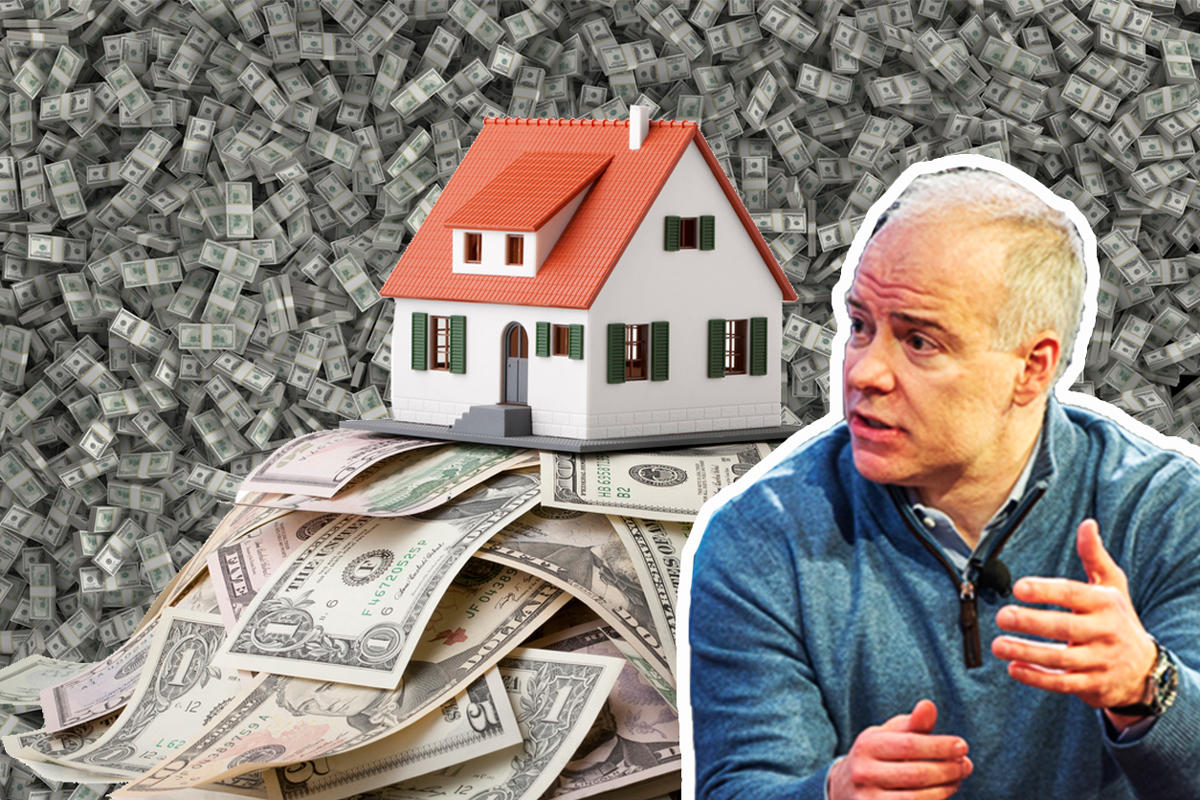 Realogy CEO Ryan Schneider with a home on piles of cash (Credit: iStock)